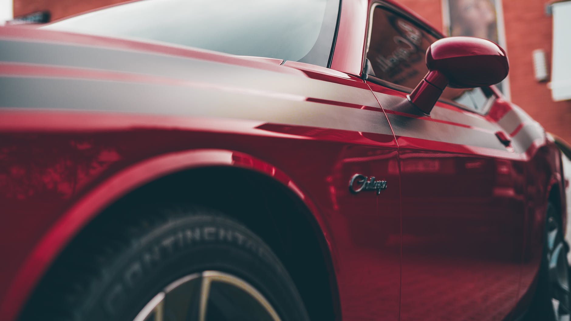 red chrome polish of luxury car